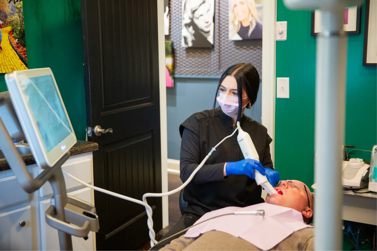 Image of someone getting their mouth scanned using an iTero Digital scanner